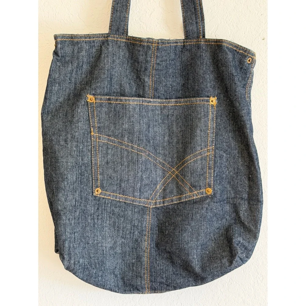 Dark Wash Denim Tote Bag with Exterior Pocket and Contrast Stitching